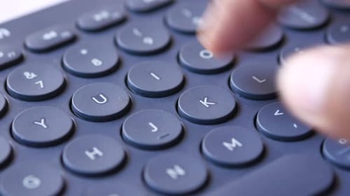 Close Up of Man Hand Typing on Keyboard