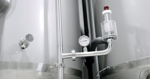 Thermostat Temperature Going Up Grain of Malt in a Beer Tank in a Factory