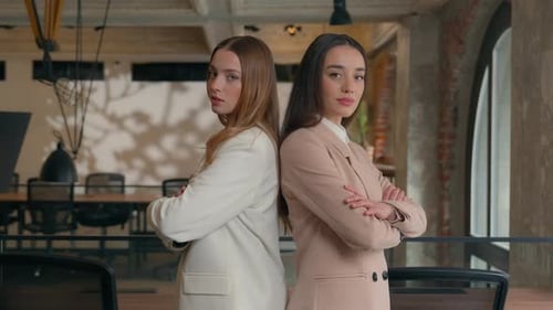 Confident Businesswomen Posing in Modern Office