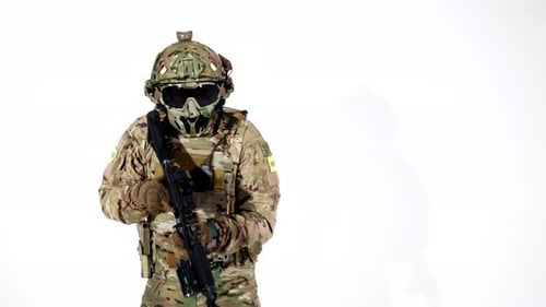 Airsoft Player with Replica of Modern Rifle in White Background in Studio Portrait of Soldier