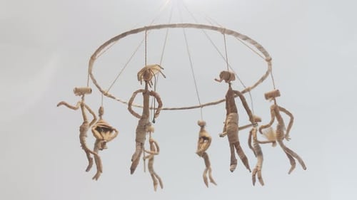Abstract Mobile with Handmade Figures Rotating Slowly