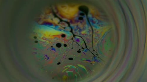 Colorful Abstract Patterns in Microscopic Liquid Surface