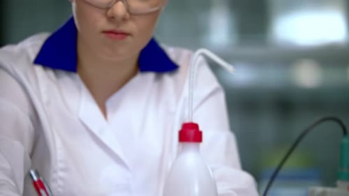 Focused Scientist Working in Research Laboratory