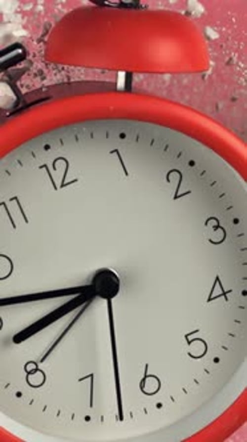 Alarm Clock and School Crayons Fly Up on a Black Background Filmed on a Highspeed Camera at 1000 Fps