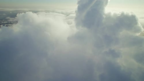 Aerial View of Fluffy White Clouds From Above