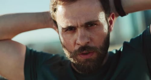 Sweaty Man Looking at Camera After Workout