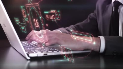 A Man Works With A Chatbot On A Laptop
