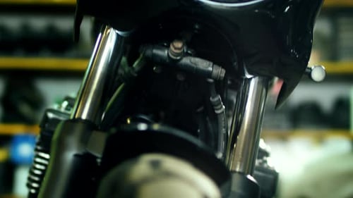 Custom Motorcycle Light. Close-Up Bright Motorbike LED Lighting. Repairing Retro Classic Motorbike