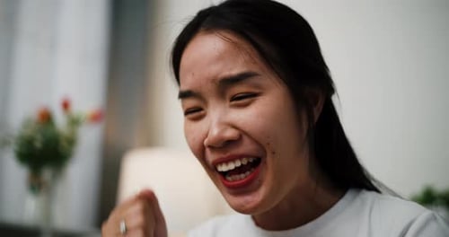 Woman Reacting With Joy and Excitement