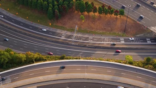 Aerial View of Downtown Atlanta with Highway Flowing Traffic Highlighting Urban Growth and