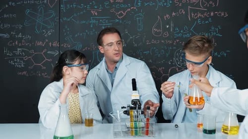 Science Class with Students and Teacher in Classroom