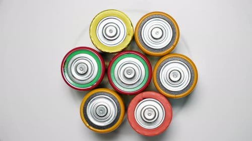 Old Used Batteries Type D Rotate in a Circle