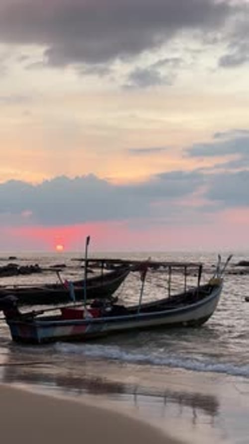 Tropical Beach Boats at Tranquil Sunset