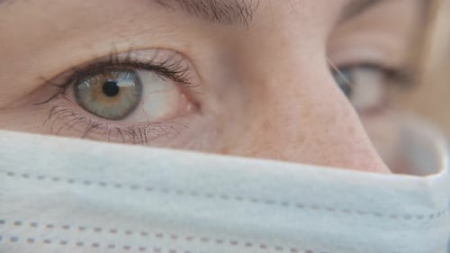 Close-Up Portrait of Modern Young Doctor Woman Wearing Protective Medical Face Mask