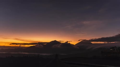 Timelapse cloudy mountain sunrise Bali Batur Mount