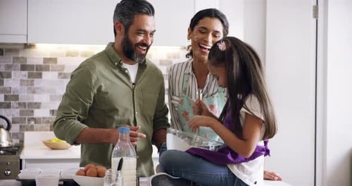 4k video footage of a family of three baking at home