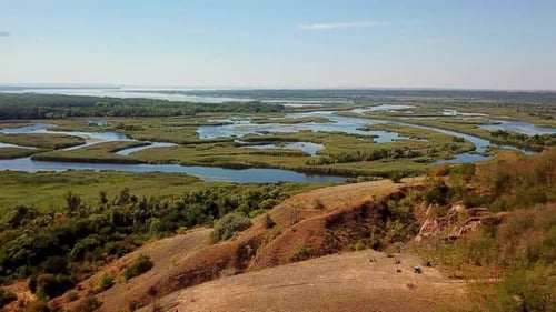 Swampy Lands That Surround A River.