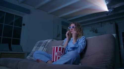 Woman in 3D Glasses Watching Movie