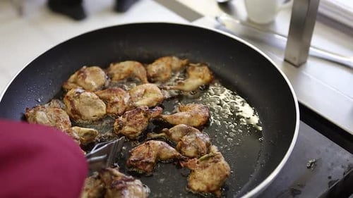 Chefs Cooking Food in Commercial Kitchen