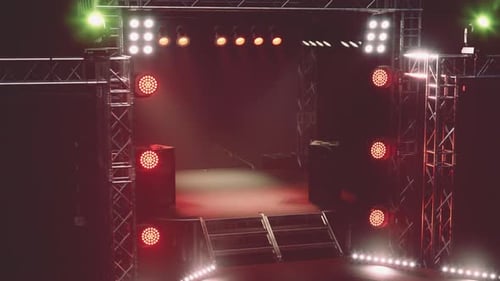 Professional Concert Stage with Dynamic Spotlights and Haze