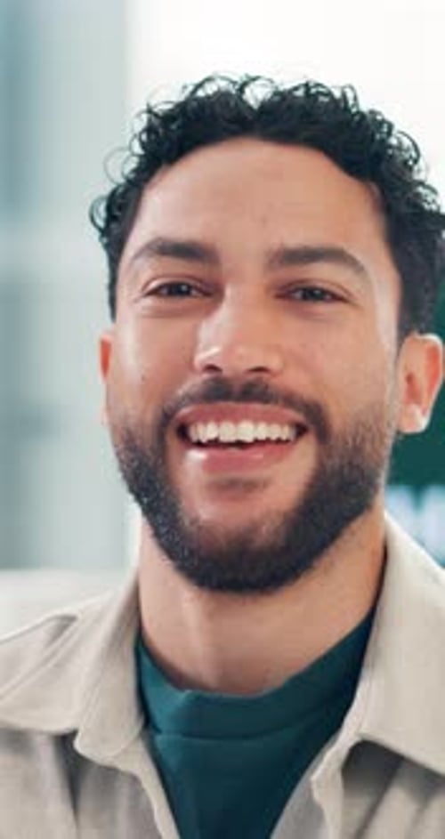 Happy, professional and face of businessman in office with confidence for creative career