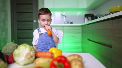 Young Child Eating Fresh Vegetables in Kitchen