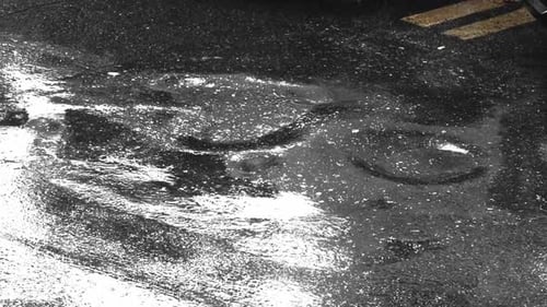 After colliding with road water rebounds, creating visual spectacle
