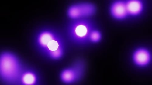 Abstract Purple Bokeh Lights Glowing Seamless Loop Background