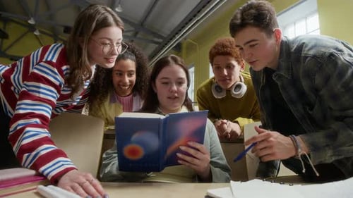 Engaged Students Reading Together in Classroom