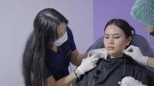 Woman Receives Filler Injection in Beauty Clinic