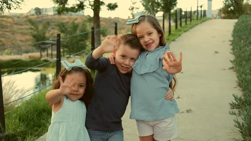 children siblings friends cousins happy enjoying their friendship playing laughing in the park