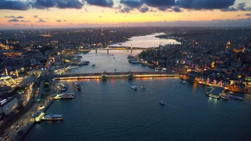 Aerial drone view of Istanbul at sunset, Turkey. Multiple residential buildings, mosques, Galata and