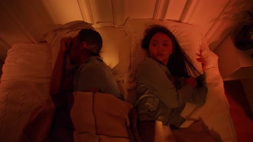 Cozy Couple Sleeping Together in Warm Bedroom