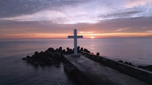 A Flight Around a Christian Holy Cross Early in the Morning at Sunrise The Large Cross Stands on the