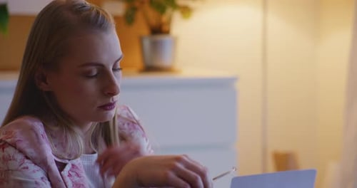 Woman Tired From Working At Home Office