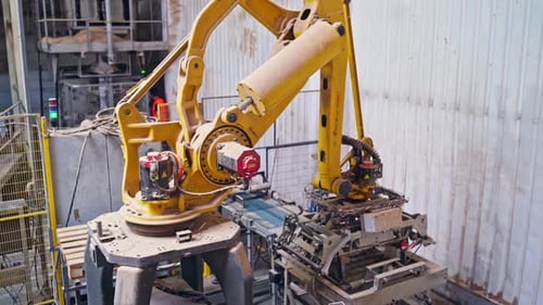 Innovativer Fabrikhintergrund. Roboterausrüstung in der Anlage. Herstellung und Produktion.