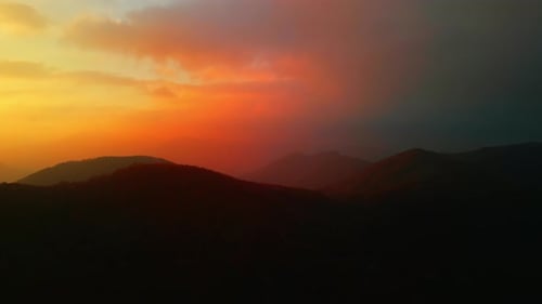 4K Sunset and Mountains Drone Shot