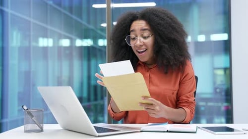 Excited Woman Receives Good News at Office