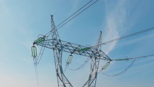 Power pylons in a field