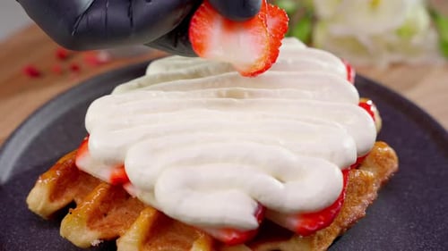Delicious Waffle with Strawberries and Whipped Cream