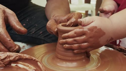 Shaping A Clay Pot In A Ceramics Workshop 33