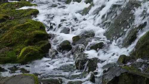 Slow Motion Footage of Flowing Waterfall Closeup Showing the Movement of Water Mountain Waterfall