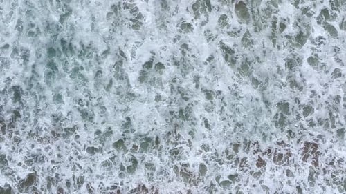 Ocean Waves Rolling to Shore Sea Water Moving Forward Ocean Surf Breaking on Sand Sea Waves Forming