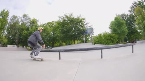 Skateboarder Performing Trick in Urban Skatepark