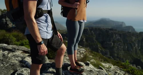 Man, woman and hiking on mountain top for view outdoor adventure climbing, gear for exercise