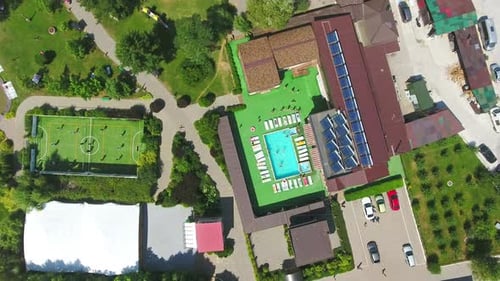 Countryside spa resort complex with diverse areas for rest. Swimming-pools, pond, tennis court