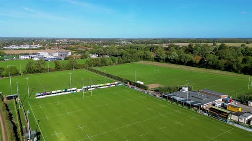 Canterbiry Rugby Club Dolly Backwards with blue sky