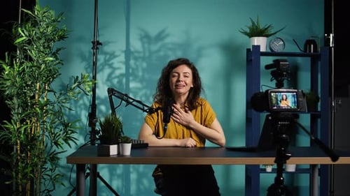 Woman Recording a Vlog in Home Studio