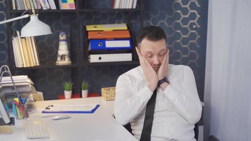 Businessman has job stress.