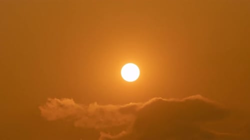 Golden Sunrise with Ominous Clouds